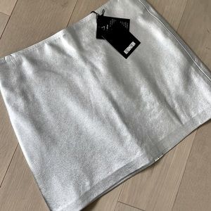 Metallic silver leather mini skirt, NWT by Reformation
